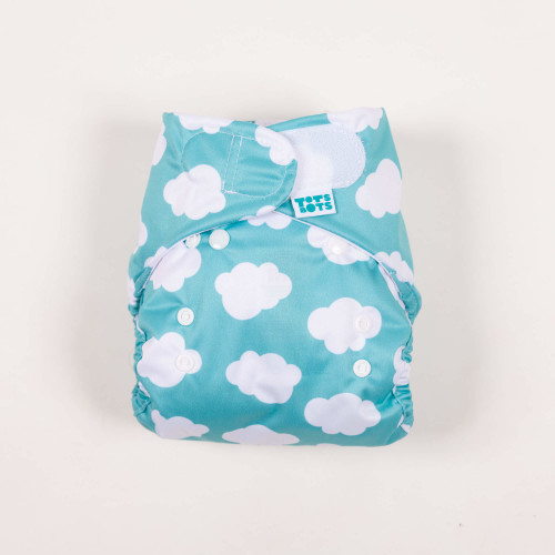 reusable nappies green fluffy clouds flatlay