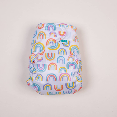 reusable nappy wrap in rainbow print flatlay