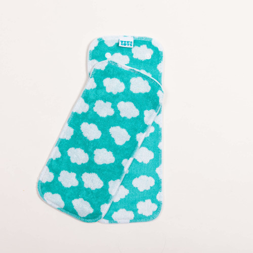 green bamboo nappy pads flatlay