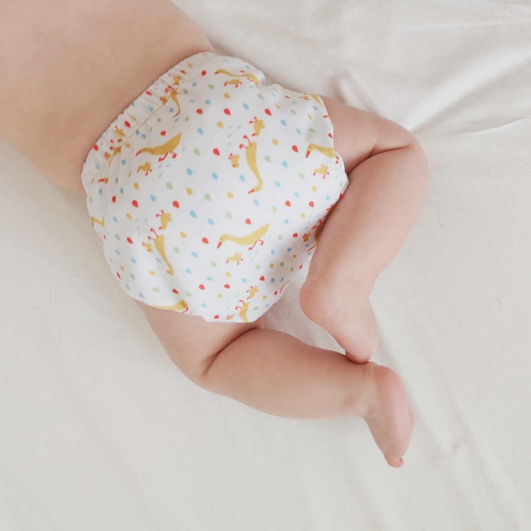 baby wearing a duck print EasyFit nappy