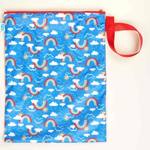 TotsBots reusable waterproof nappy bag in Frugi Rainbow Skies print