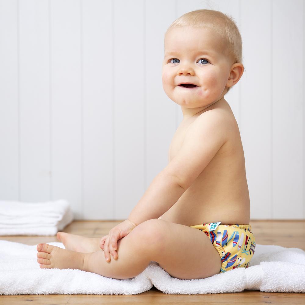 TotsBots Reusable swim Pants in Frugi print Surfs Up