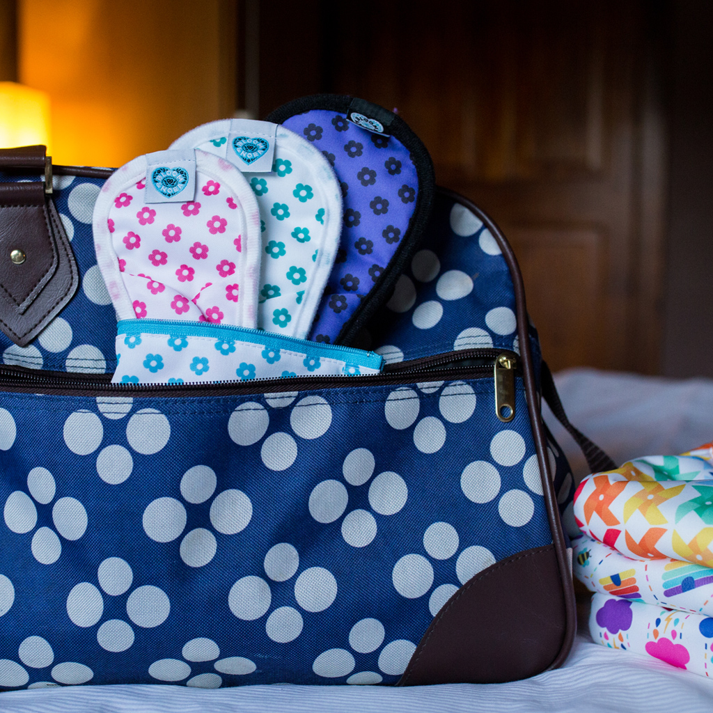 Using reusable sanitary pads for bleeding after birth.